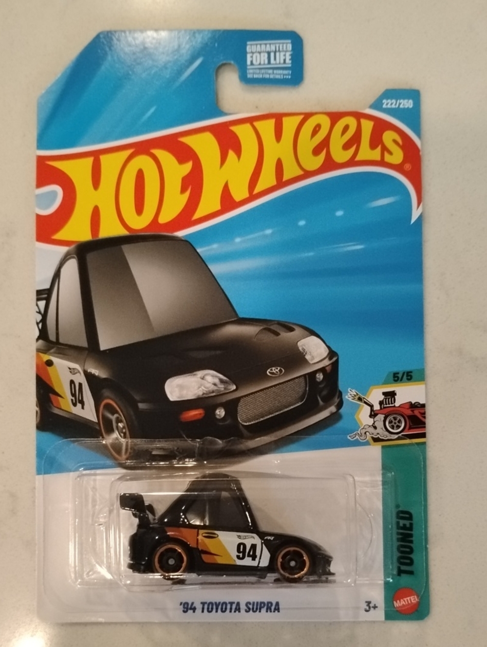Mattel Hot Wheels '94 Toyota Supra Black with Orange and White Racing Graphics